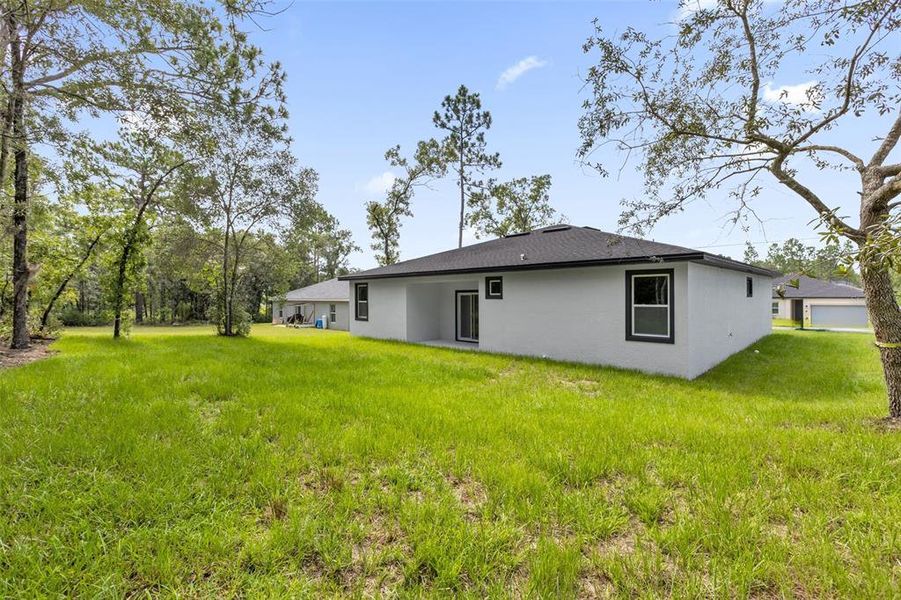 Exterior details and patio area of a home in , Ocala (Image 3).