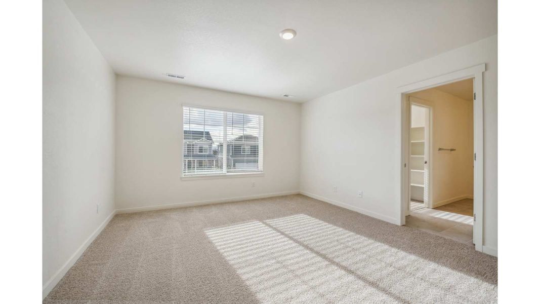 Representative unfurnished interior of a home built from the ELDER II by D.R. Horton in The Ridge at Lorson Ranch, Colorado Springs (Image 13).