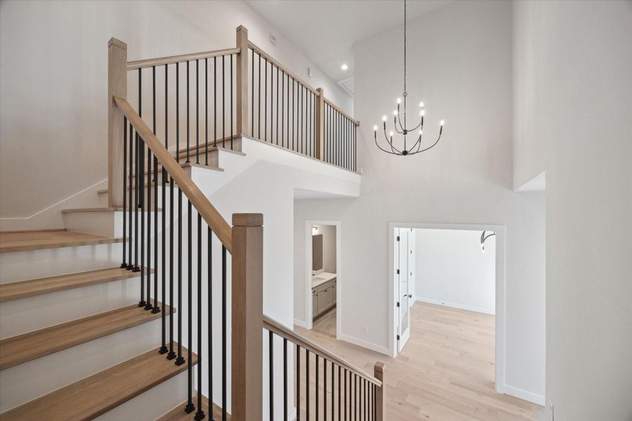 Staircase and Entry - Primary Bath - similar to 431 Venado View