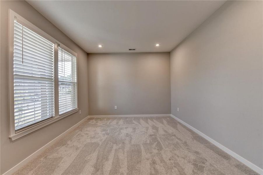 Spacious, unfurnished interior of a new home in The Reserve At Liberty Park, Braselton (Image 25).