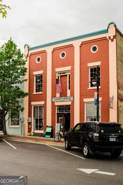 Front exterior of a new home in Ponderosa Farms Manor, Gainesville, GA, highlighting curb appeal (Image 34).