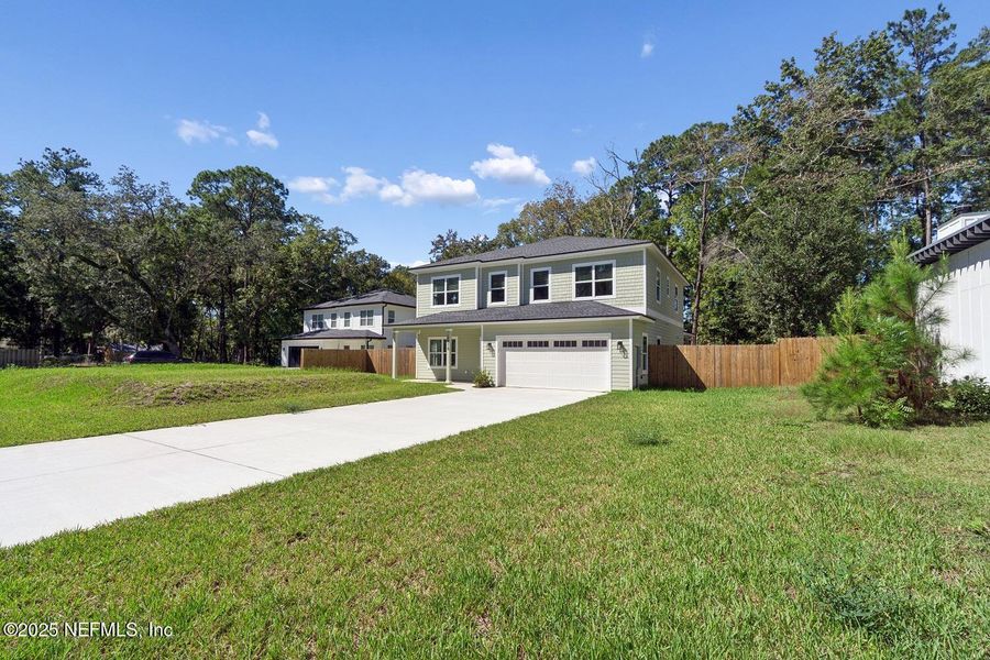 Front exterior of a new home in , Jacksonville, FL, highlighting curb appeal (Image 1). Front exterior of a new home in , Jacksonville, FL, highlighting curb appeal (Image 1).