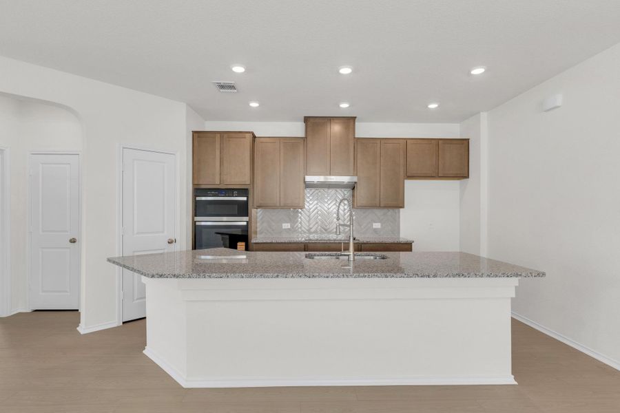 Furnished interior view inside a new home in Retreat at San Gabriel, Georgetown (Image 9).
