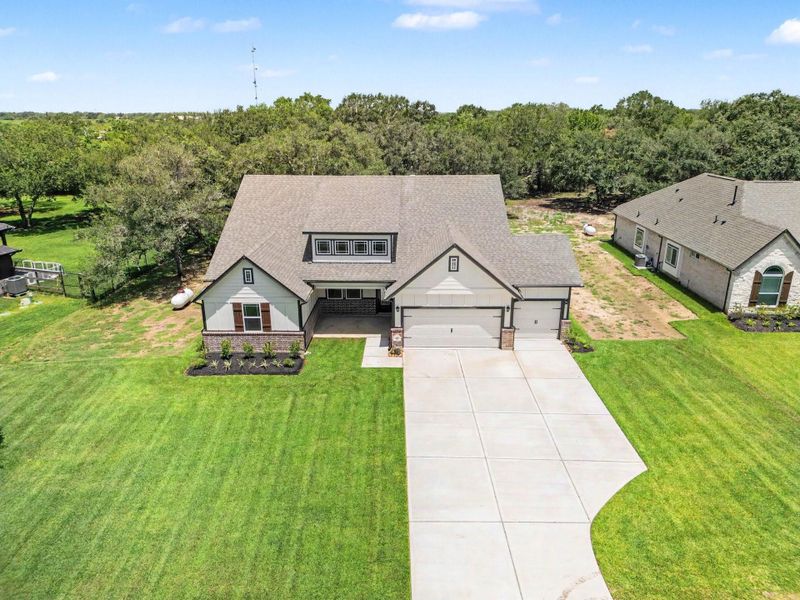 Front exterior of a new home in , Bay City, TX, highlighting curb appeal (Image 1). Front exterior of a new home in , Bay City, TX, highlighting curb appeal (Image 1).