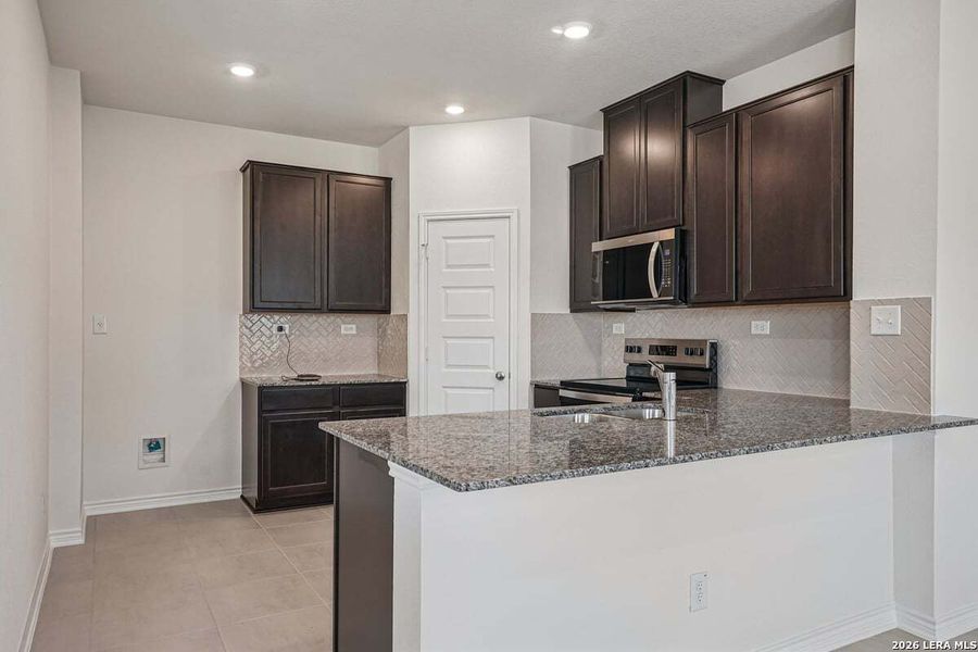Furnished interior view inside a new home in Medina Crossing, Von Ormy (Image 8).