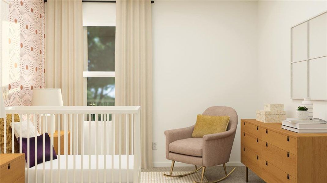 Bedroom featuring a crib and carpet floors