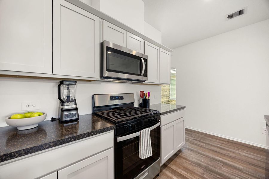Furnished interior view inside a new home in Breckenridge Forest, Spring (Image 10).