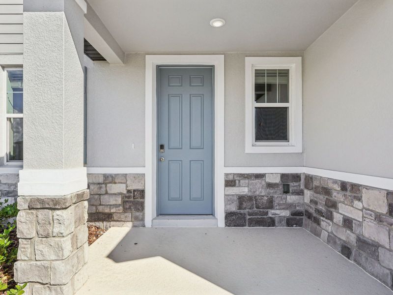 Exterior details and patio area of a home in The Meadow at Crossprairie, St. Cloud (Image 2).