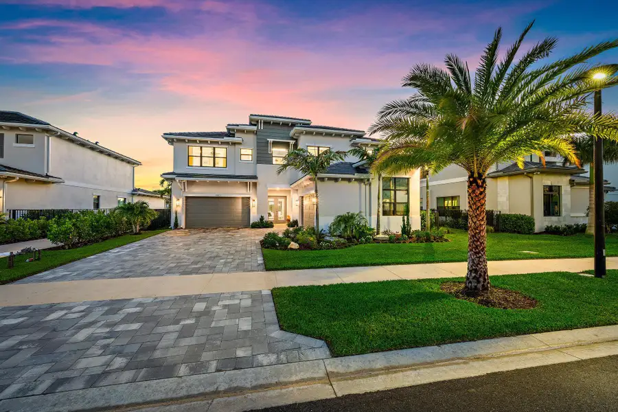 Upgraded driveway pavers and exterior lighting.