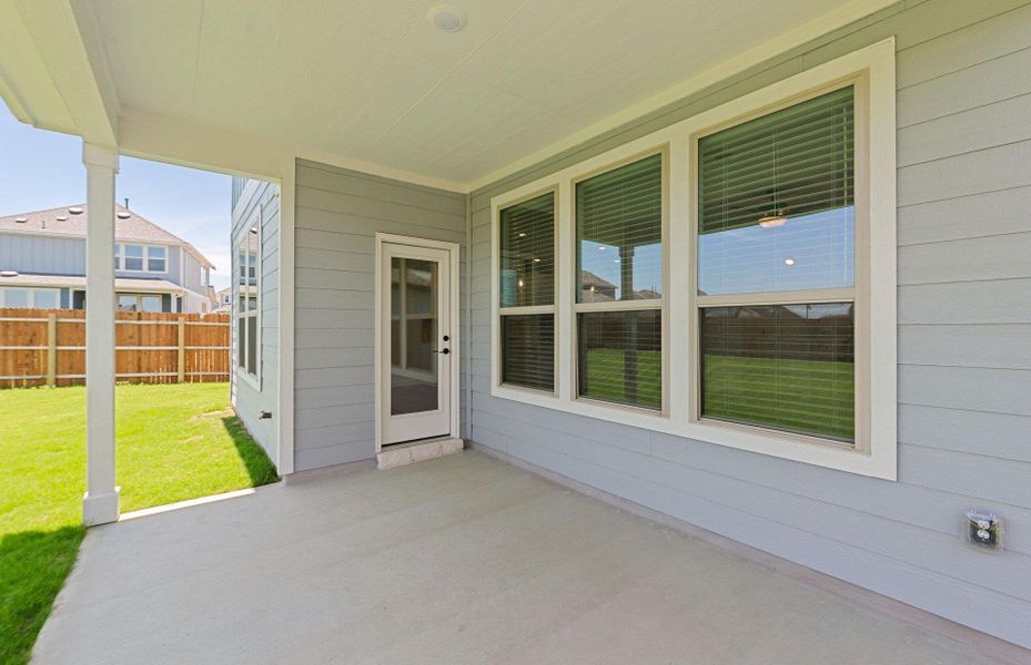 Exterior details and patio area of a home in Santa Rita Ranch, Liberty Hill (Image 22).
