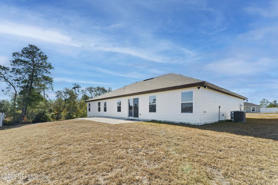 Exterior details and patio area of a home in , Ocala (Image 27).