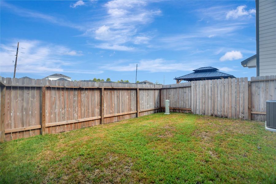 Exterior details and patio area of a home in Legacy Park, Houston (Image 3).