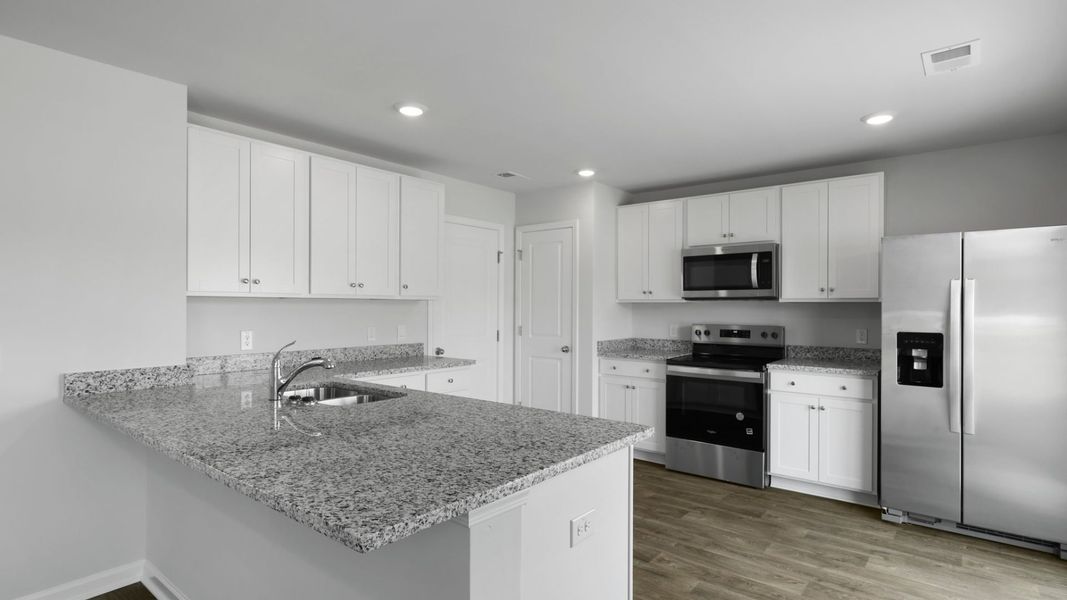 Representative furnished interior of a home built from the BRANDON by D.R. Horton in Evergreen, Holly Hill (Image 5).