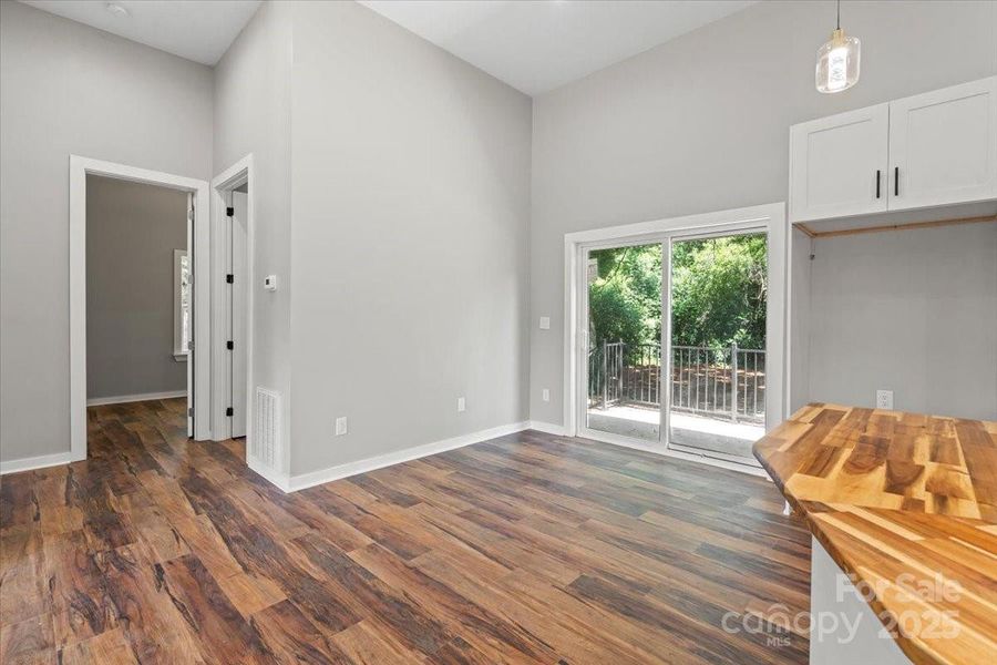 Sliding door opens to back porch patio Sliding door opens to back porch patio