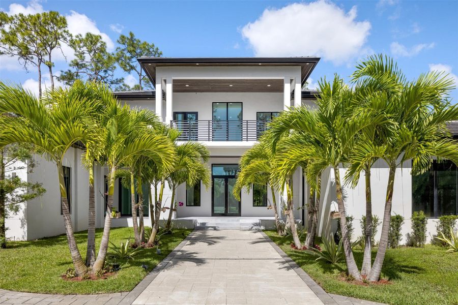 Front exterior of a new home in , Parkland, FL, highlighting curb appeal (Image 2).