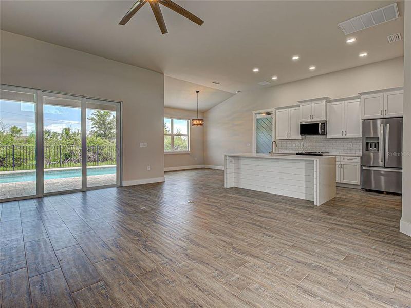 Spacious, unfurnished interior of a new home in , Port Charlotte (Image 61).