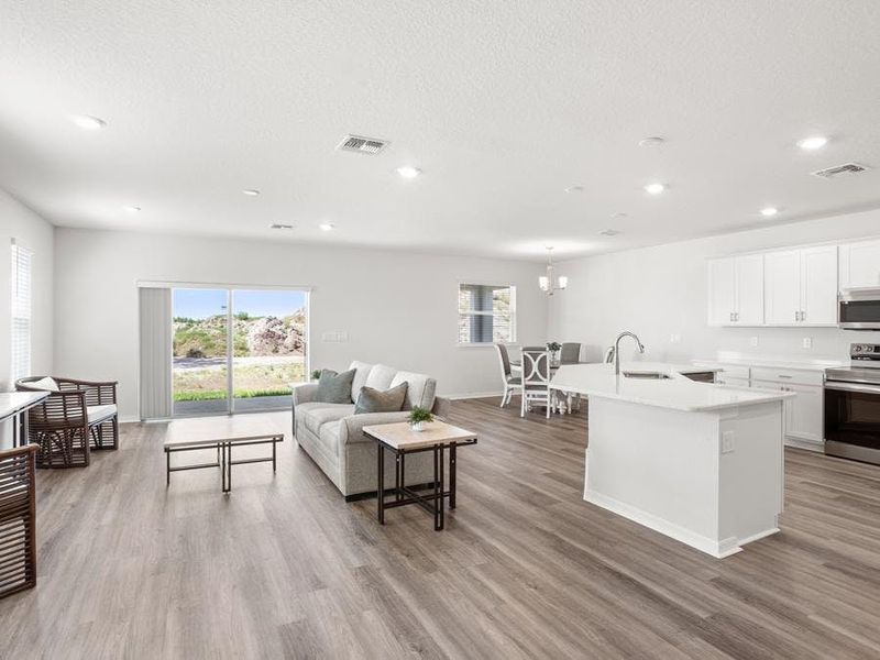 The living space is filled with natural light - Wesley II by Highland Homes The living space is filled with natural light - Wesley II by Highland Homes