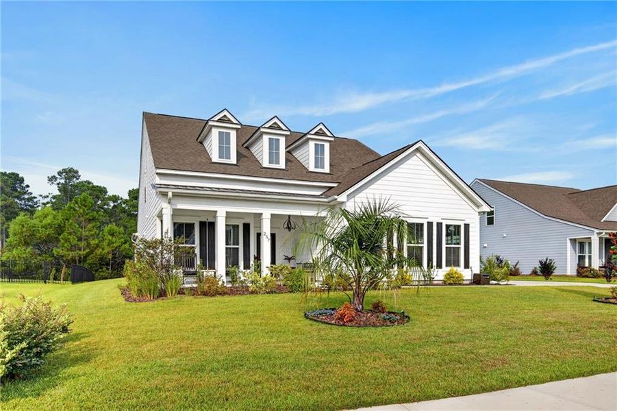 Front exterior of a new home in , Richmond Hill, GA, highlighting curb appeal (Image 29). Front exterior of a new home in , Richmond Hill, GA, highlighting curb appeal (Image 29).