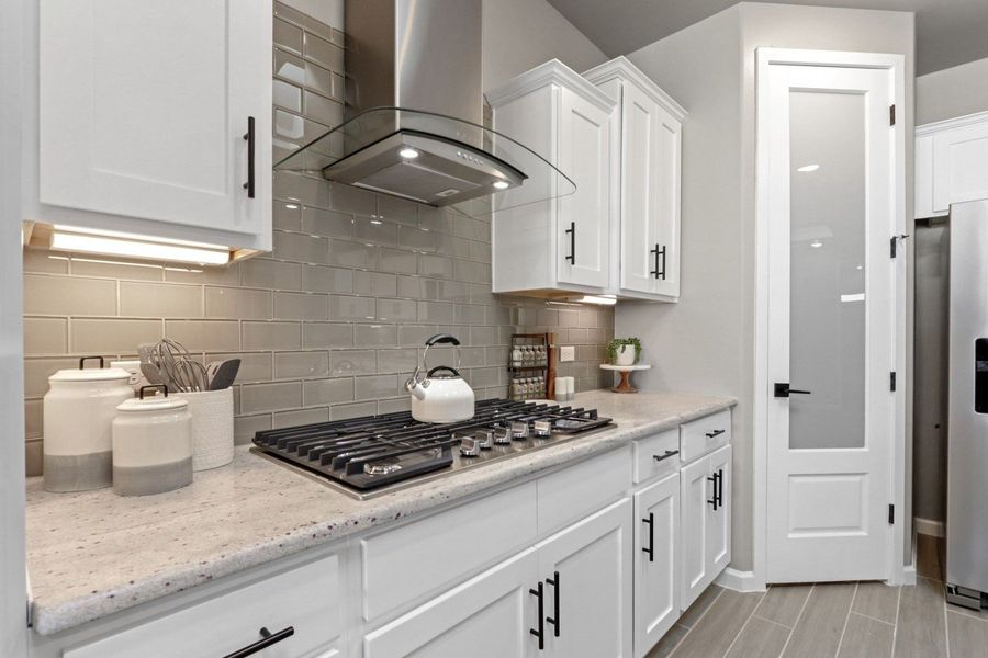 Representative furnished interior of a home built from the Pershing by Hakes Brothers in Paseo Del Este, El Paso (Image 8).