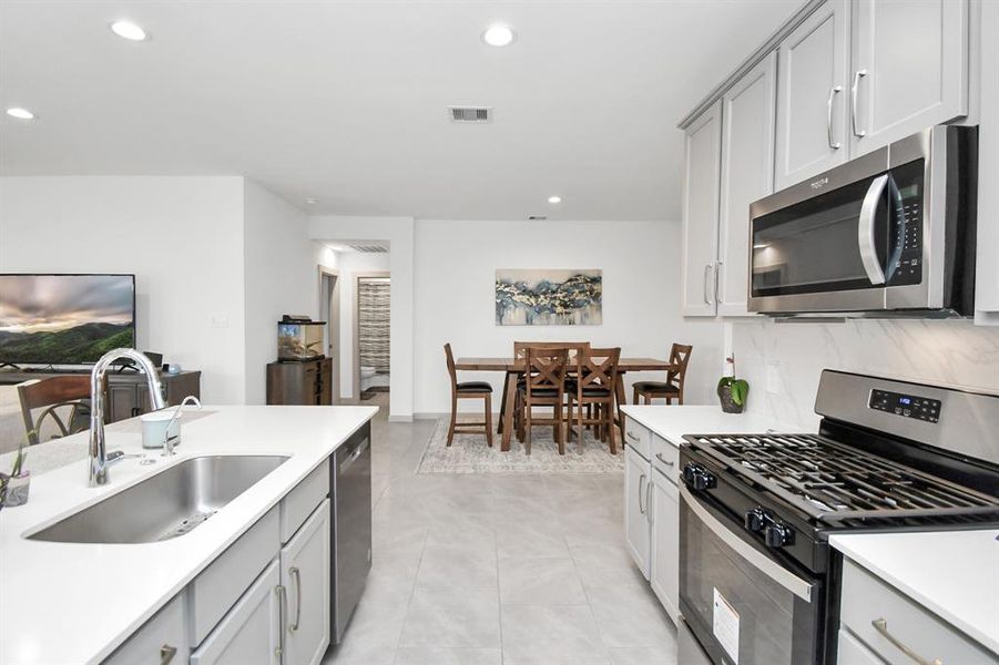 Kitchen open to dining area