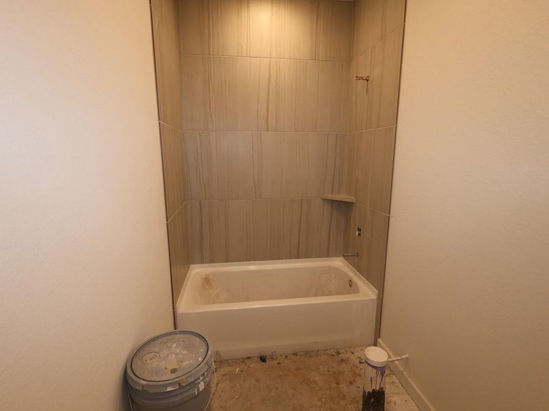 In-progress construction of a new home in Pinewood at Grand Texas, New Caney, TX (Image 20).