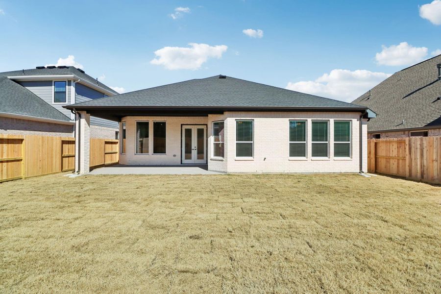 Exterior details and patio area of a home in The Highlands, Porter (Image 3).