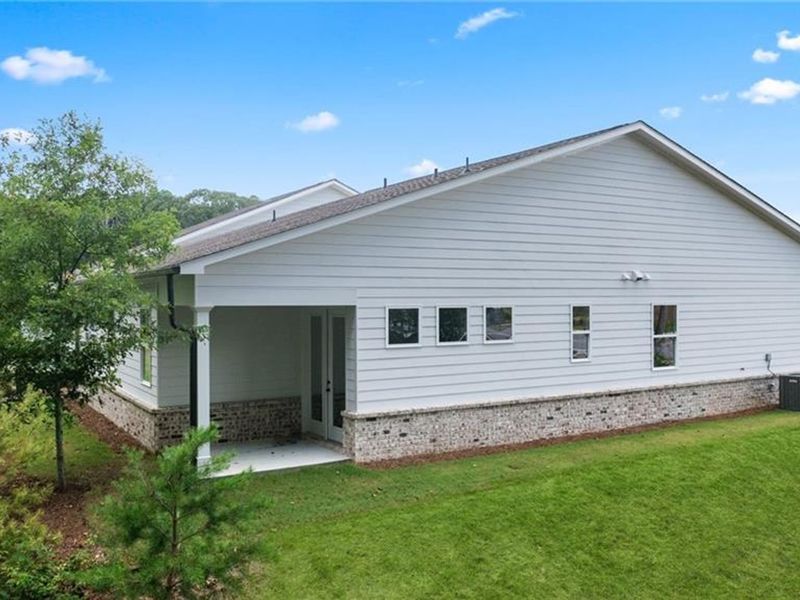 Exterior details and patio area of a home in Kelly Preserve, Loganville (Image 25).