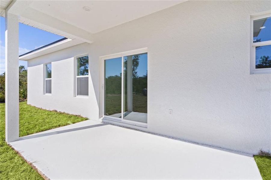 Covered lanai with room for table and chairs