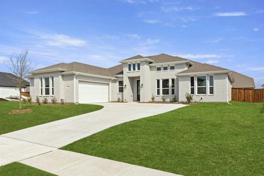 Front exterior of a new home in Kentsdale Farms, DeSoto, TX, highlighting curb appeal (Image 26). Front exterior of a new home in Kentsdale Farms, DeSoto, TX, highlighting curb appeal (Image 26).