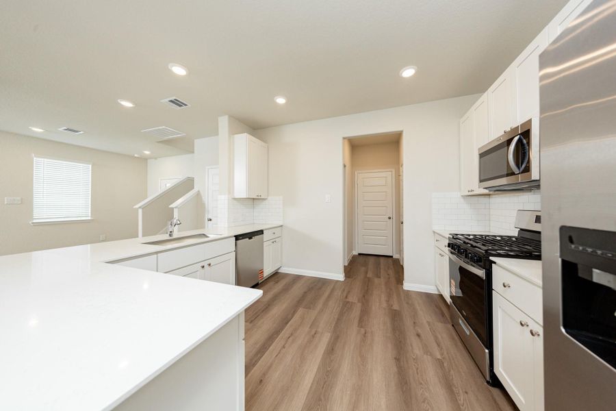 Furnished interior view inside a new home in River's Edge, Conroe (Image 8).