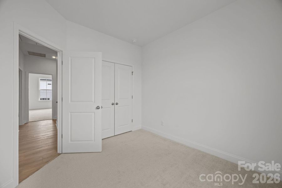Spacious, unfurnished interior of a new home in The River District Townhomes, Charlotte (Image 28).