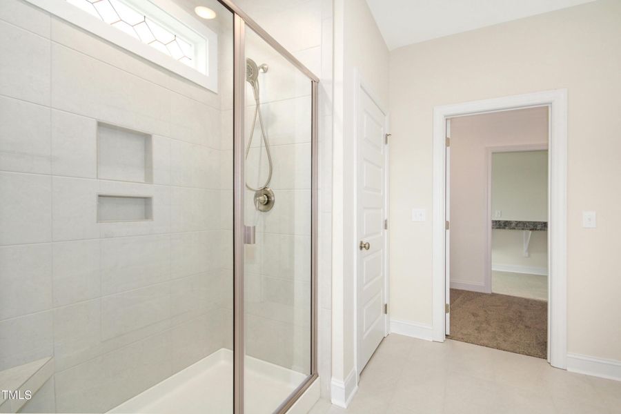 Walk in tile shower in ensuite