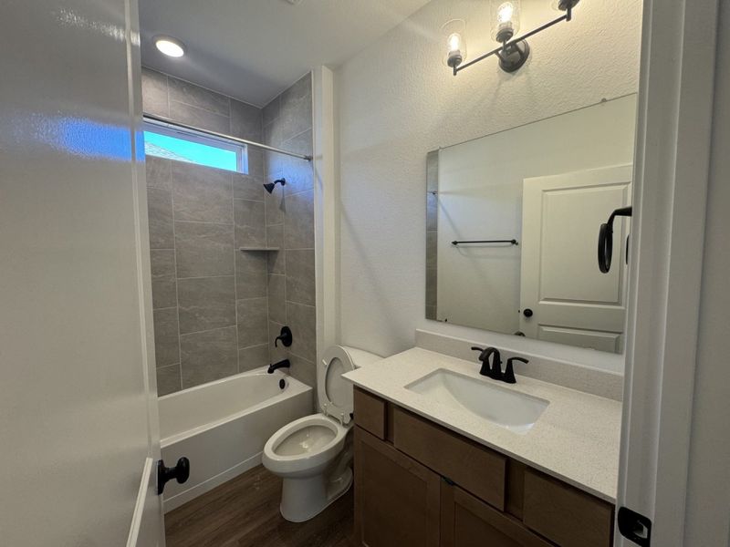 Furnished interior view inside a new home in Village at Three Oaks, Seguin (Image 10).