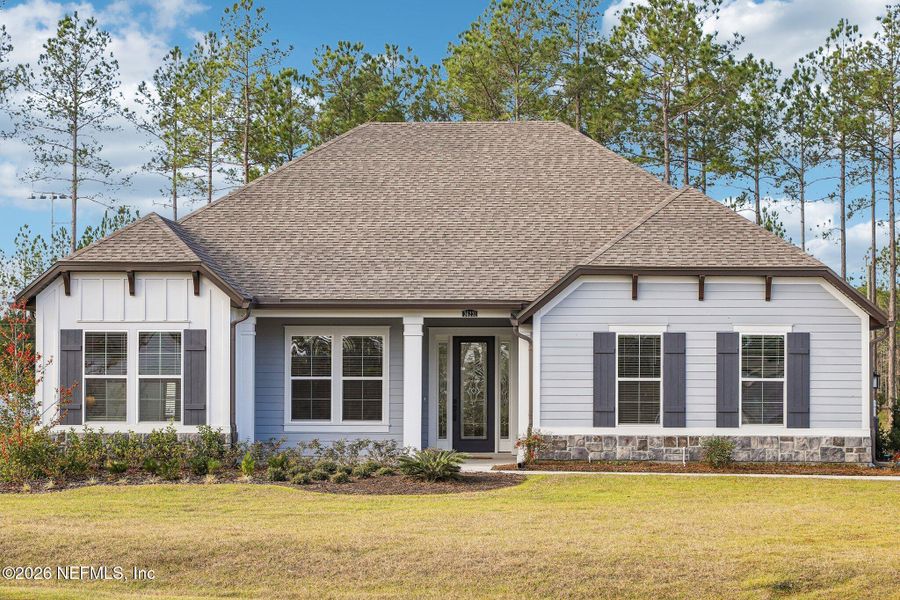 Front exterior of a new home in , Hilliard, FL, highlighting curb appeal (Image 2). Front exterior of a new home in , Hilliard, FL, highlighting curb appeal (Image 2).