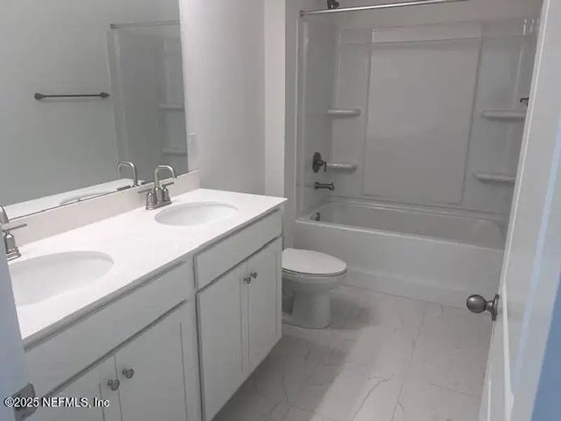 Furnished interior view inside a new home in Brook Forest, St. Augustine (Image 5).