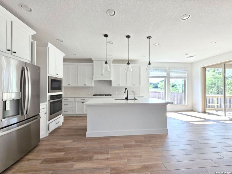 Furnished interior view inside a new home in Stevens Ranch, San Antonio (Image 11).