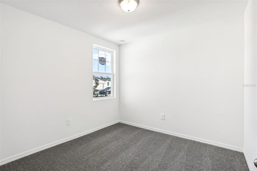 Spacious, unfurnished interior of a new home in Lake Deer Estates - Classic Series, Poinciana (Image 22).