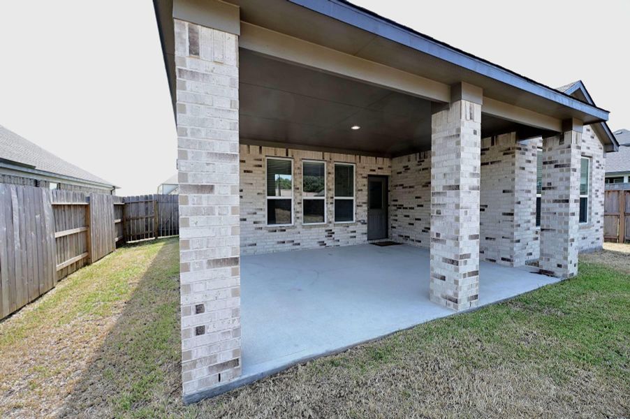 Exterior details and patio area of a home in Oakwood, Tomball (Image 2). Exterior details and patio area of a home in Oakwood, Tomball (Image 2).