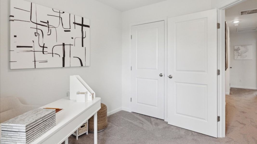 Representative furnished interior of a home built from the Altamont Townhome by D.R. Horton in Saint Marc's, Powell (Image 22).