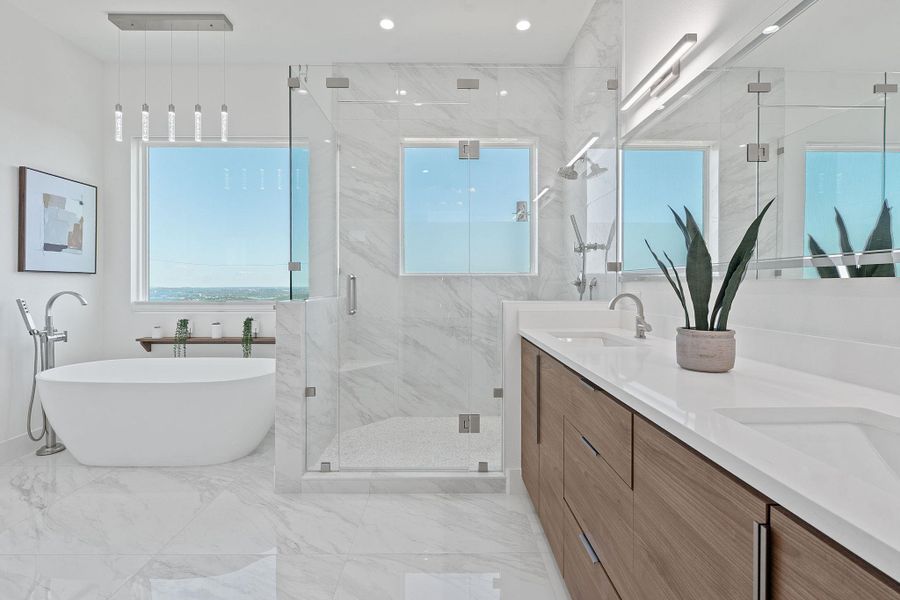 Spacious room for his and her. Views of Lake Travis from shower and bath. Spacious room for his and her. Views of Lake Travis from shower and bath.