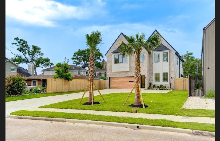 Expansive front lawn and an even larger backyard — perfect for family fun, gatherings, and hosting large parties.