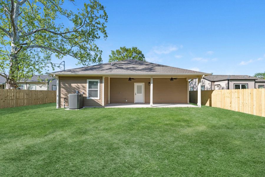 The backyard is fully fenced and spacious. Enjoy backyard BBQ's with family and friends. Did you notice the 4 ton TRANE AC unit? It will definitely keep you cool during the hot summer months.