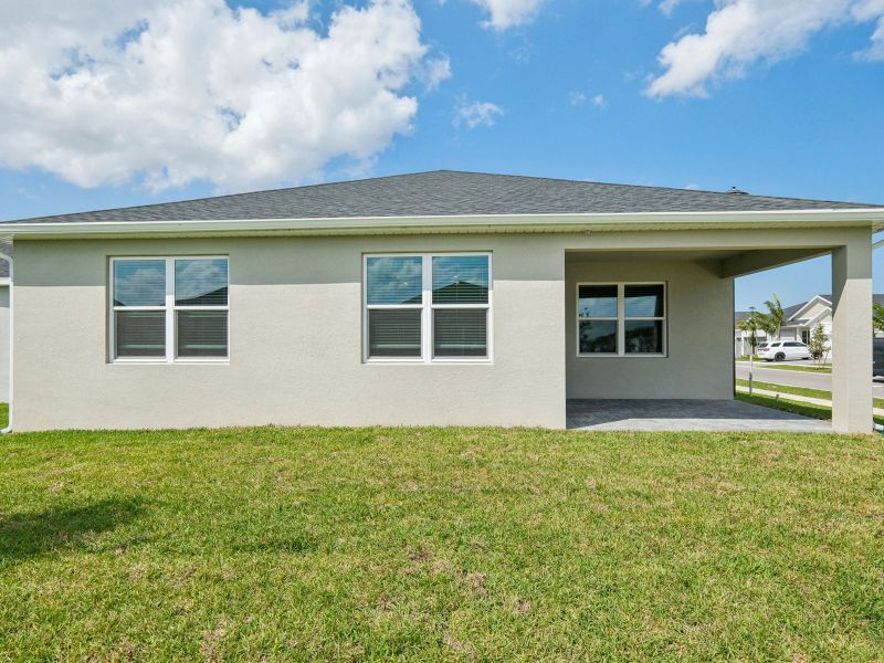 Exterior details and patio area of a home in Brystol at Wylder - Reserve Series, Port St. Lucie (Image 4).