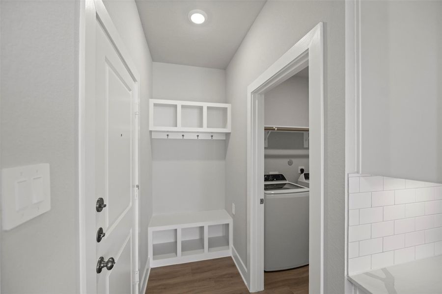 Mud room just off the garage and laundry room area. Mud room just off the garage and laundry room area.