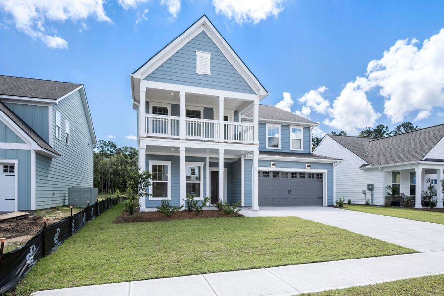 Front exterior of a new home in Waterways, Richmond Hill, GA, highlighting curb appeal (Image 26).