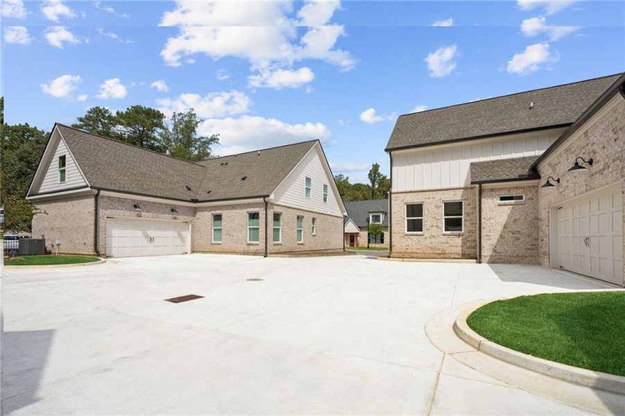 Front exterior of a new home in , Roswell, GA, highlighting curb appeal (Image 29).