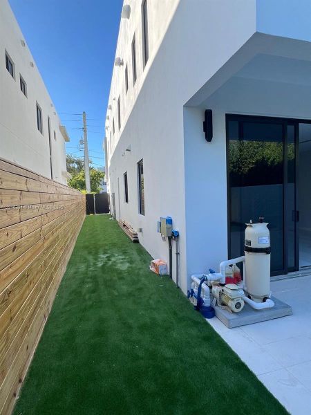 Exterior details and patio area of a home in , Miami (Image 3). Exterior details and patio area of a home in , Miami (Image 3).