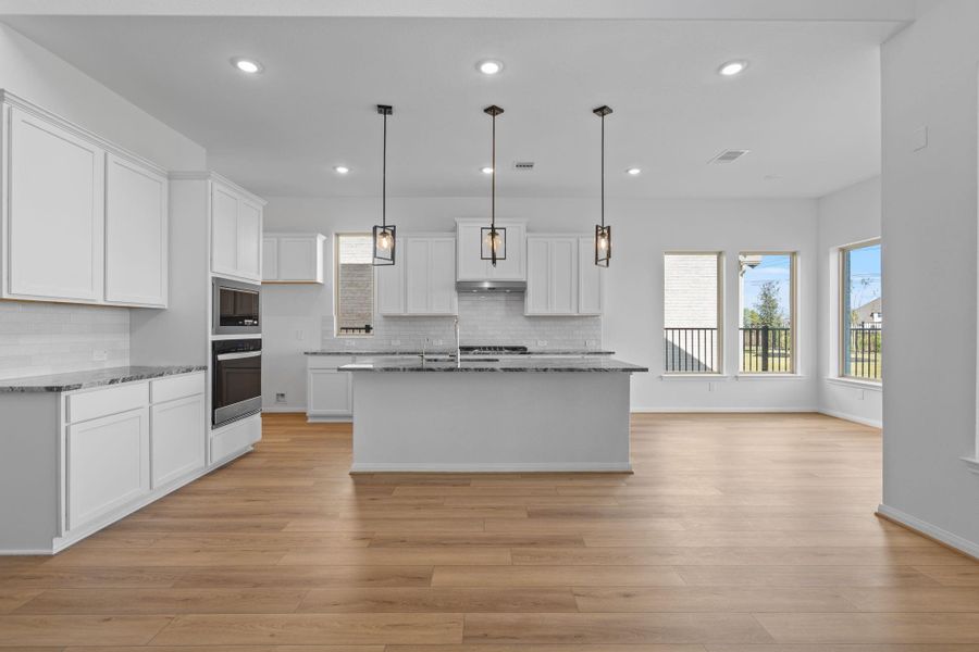 Furnished interior view inside a new home in Bridgeland 55', Cypress (Image 8).