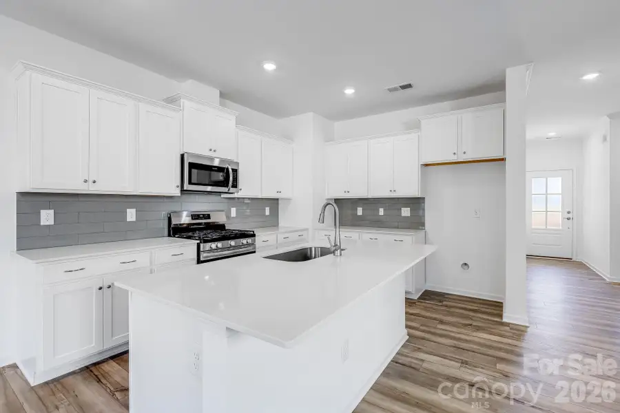 Furnished interior view inside a new home in Cannon Village, York (Image 4).