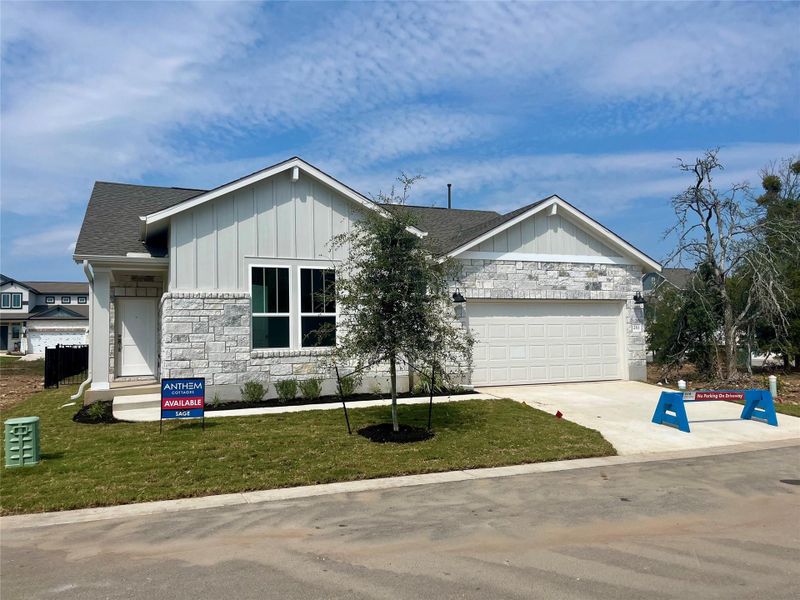 Front exterior of a new home in Anthem Cottages, Kyle, TX, highlighting curb appeal (Image 21).
